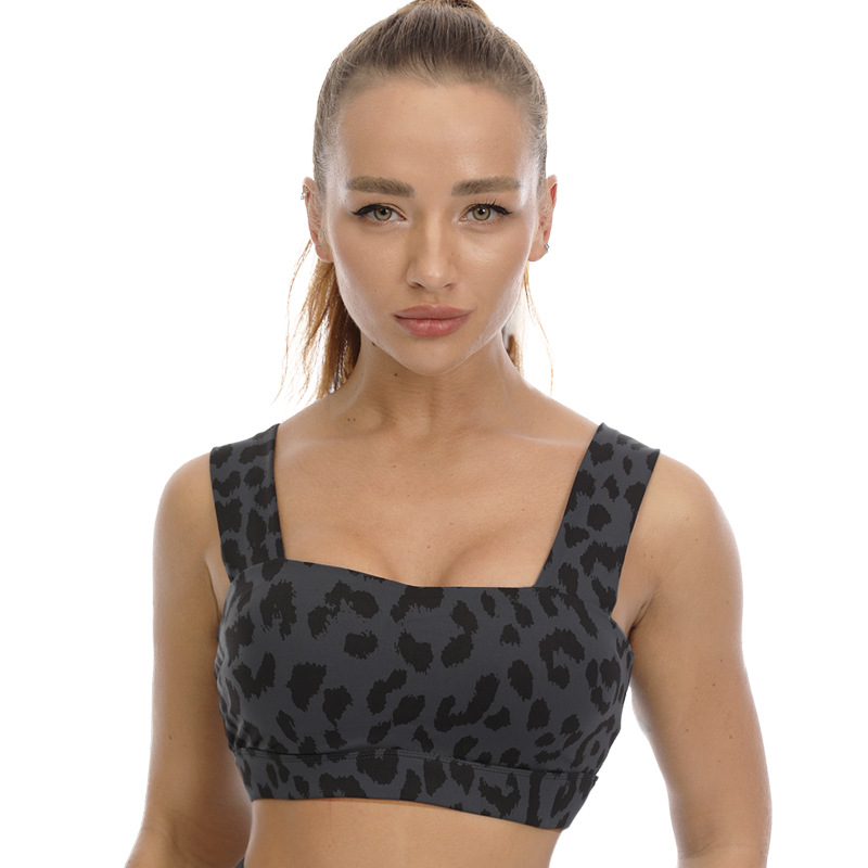 Les femmes personnalisent l'entraînement sans couture Soutien-gorge de sport sexy Gym Running Athletic Fitness Open Cross Back Leopard Sport Yoga Bras